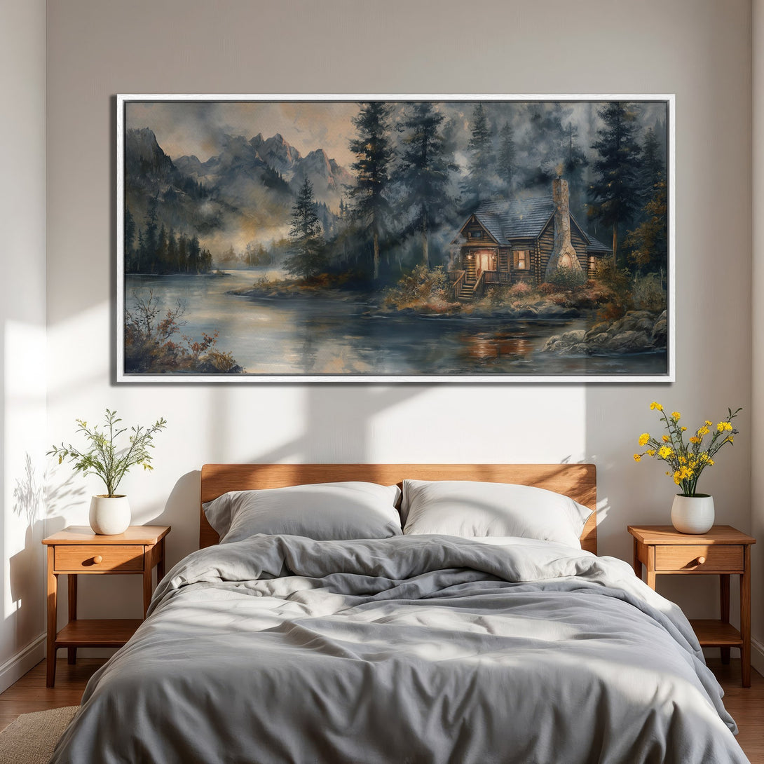 Framed Wall Art: Serene cabin scene in a misty landscape. Earthy tones and cool blues create a calming atmosphere. Bring nature indoors with this beautiful art piece.