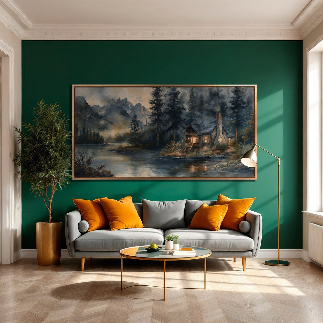 Framed Wall Art featuring a cozy cabin scene in a misty forest, with a muted blue and green color palette. Perfect for adding warmth to any space.