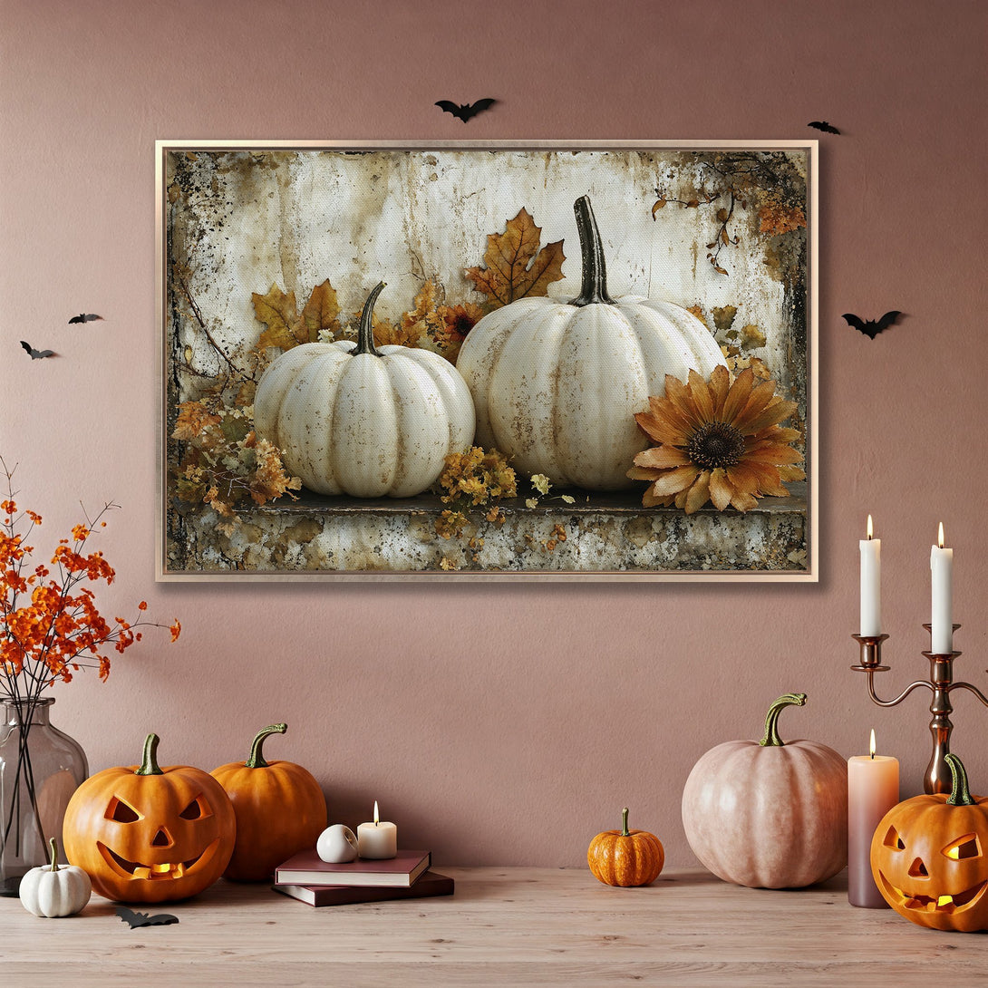 Framed Wall Art featuring pumpkins & autumn leaves in a warm, neutral color palette. Perfect for fall decor!