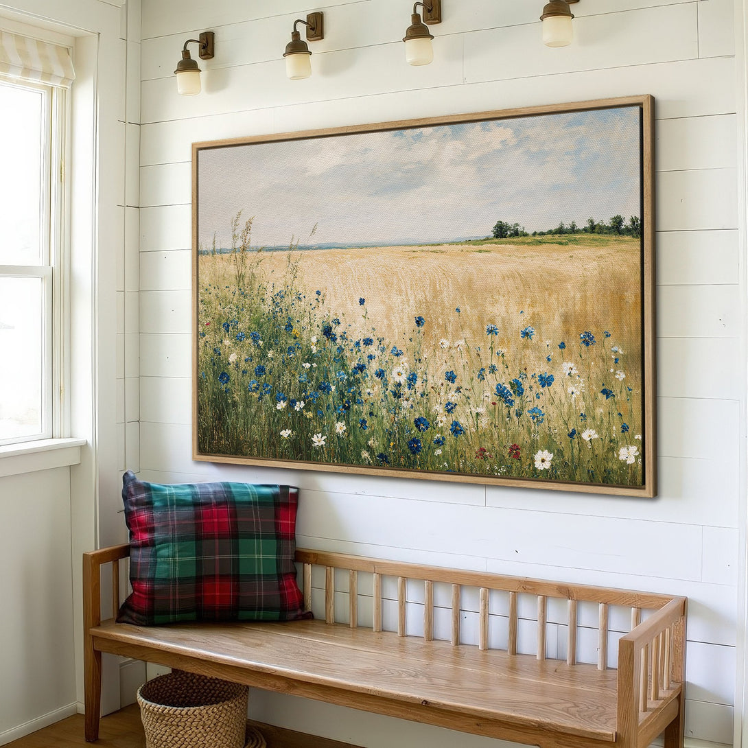 Framed Wall Art: Field of wildflowers canvas print in a neutral interior. Earthy tones with blue and gold hues create a calming aesthetic. Perfect for farmhouse decor.