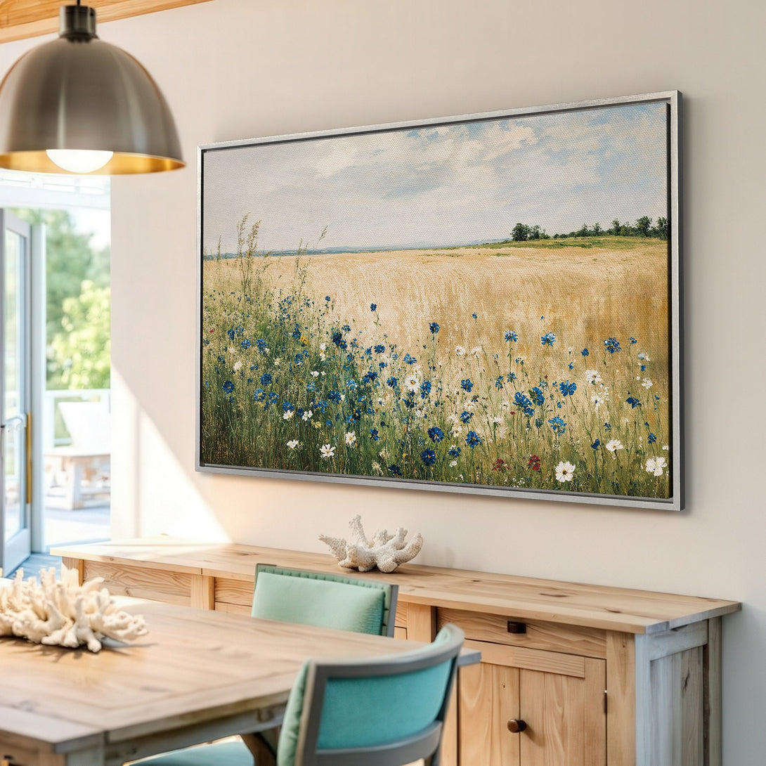 Framed Wall Art: Beautiful field of wildflowers Canvas Print. Rustic style with blue, yellow, and green color palette. Perfect for adding a touch of nature to your home.