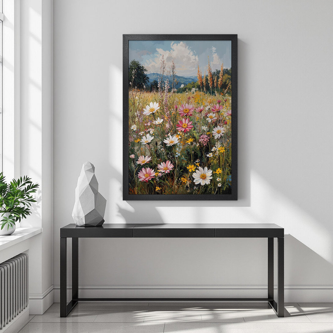 Framed Poster of a vibrant wildflower meadow painting in a black frame. Features a colorful palette of pinks, whites, yellows, and greens. Perfect wall art!
