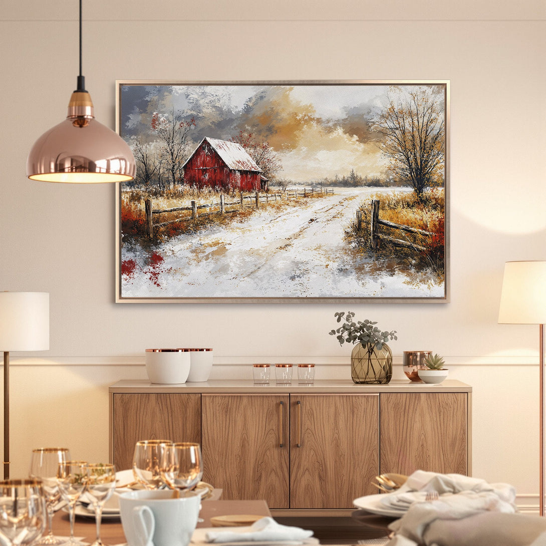 Framed Wall Art: Rustic winter barn scene canvas print with red, white, and gold tones, perfect for farmhouse decor.