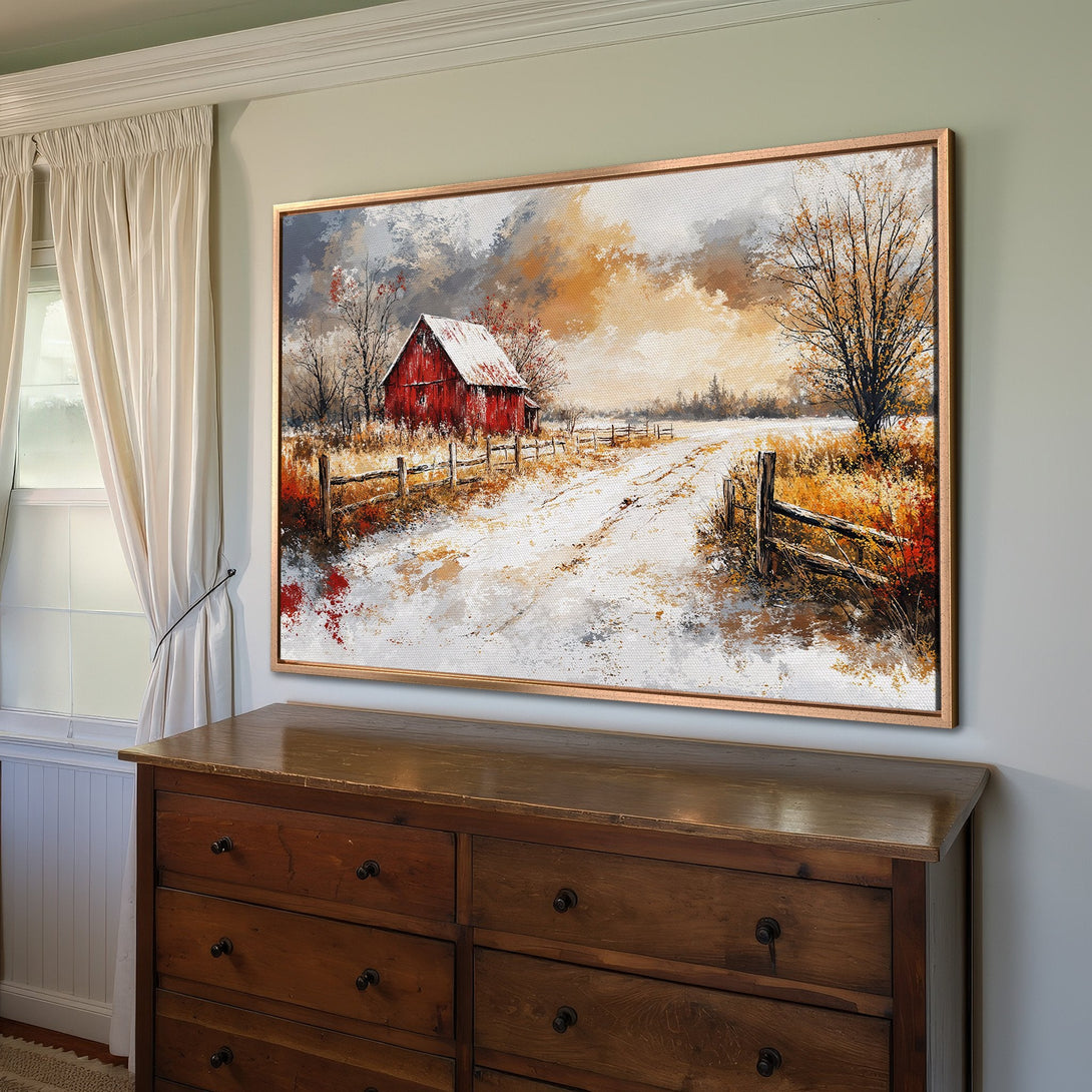 Framed Wall Art: Rustic winter landscape Canvas Print featuring a red barn, snowy path, and warm orange/brown color palette. Perfect for farmhouse decor.