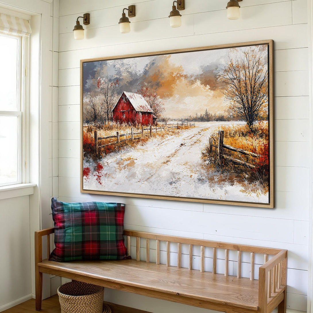 Framed Wall Art: Rustic winter barn scene canvas print in warm orange, red, and white tones. Perfect for farmhouse decor!