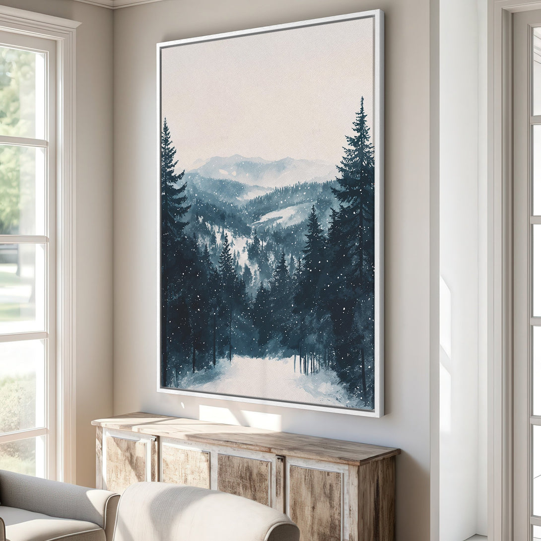 Framed Wall Art featuring a serene watercolor landscape of a snowy forest in a blue and white color palette, perfect for home decor.