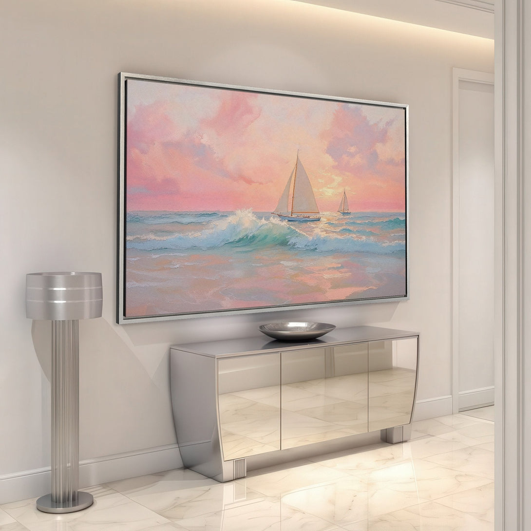 Framed Wall Art: Coastal sunset scene with sailboats in a pastel pink and blue color palette. Perfect for adding serene vibes to your home.