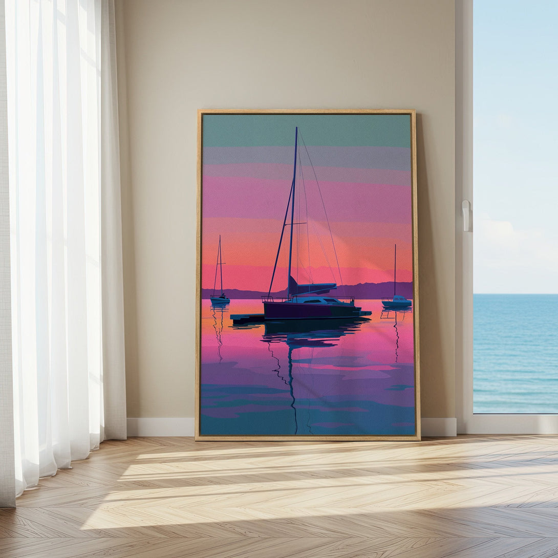 Framed Wall Art: Sunset sailboat scene in vibrant pinks and blues. Coastal art print adds a pop of color and style to any room.