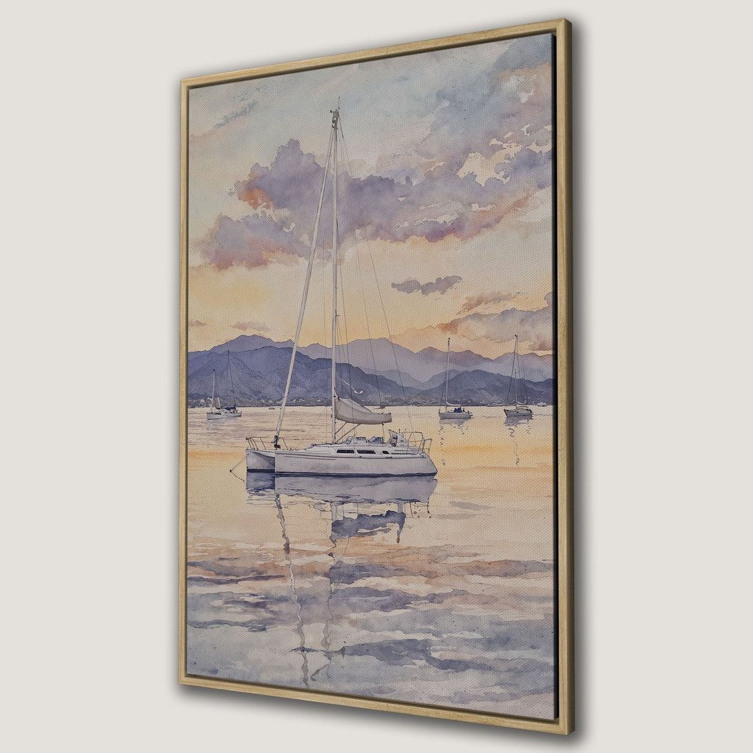 Framed Wall Art: Watercolor painting of sailboats on the water at sunset. Soft blues, oranges, and purples create a serene coastal scene.