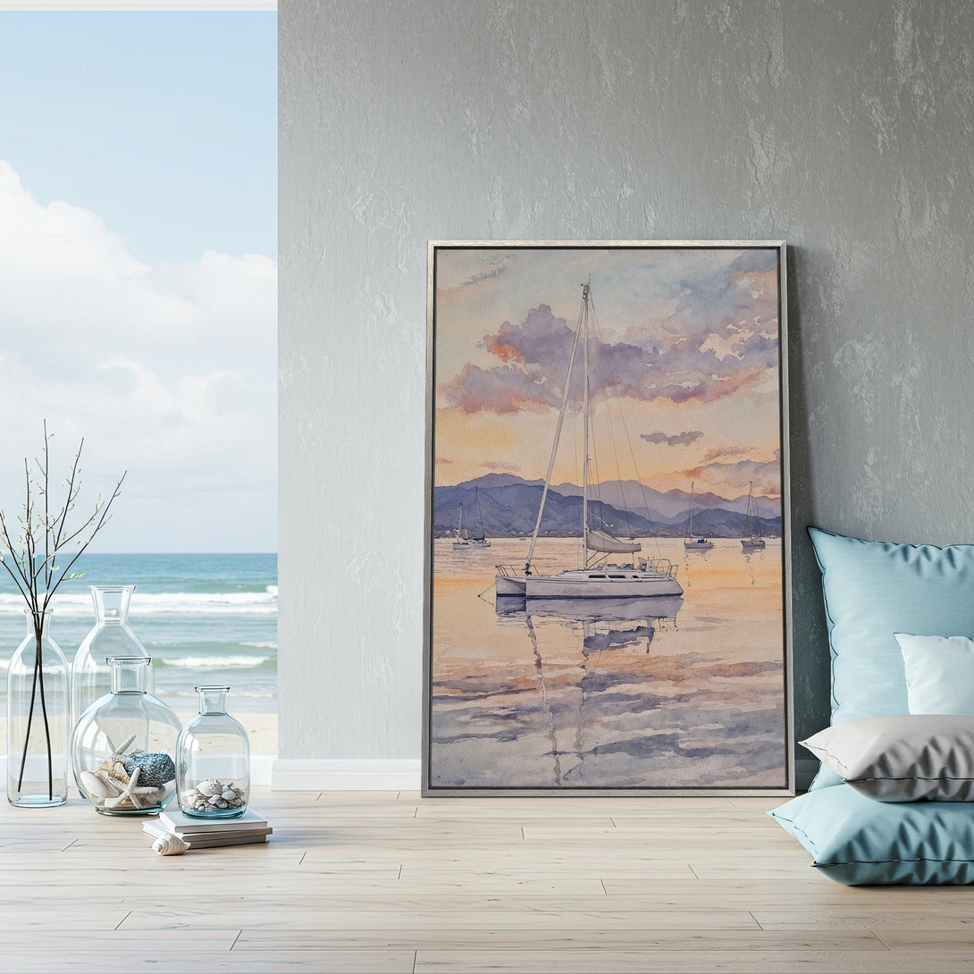 Framed Wall Art: Watercolor sailboat print in coastal style. Soft blues, oranges, and purples create a serene atmosphere. Perfect for living room decor!
