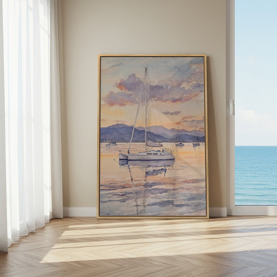 Framed Wall Art featuring a watercolor sailboat scene in a serene, pastel color palette. Perfect coastal decor for your home!