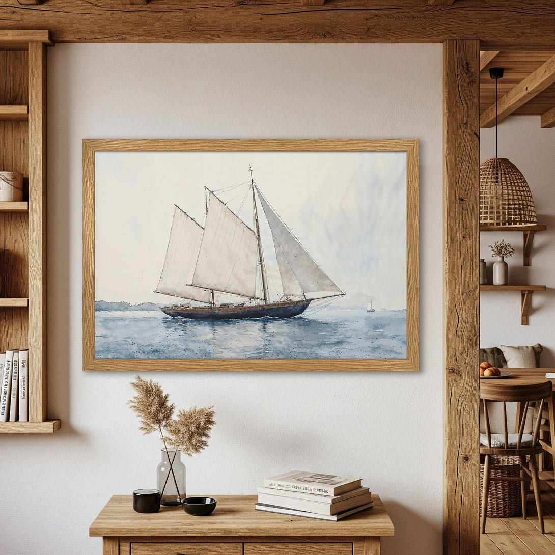 Framed Poster featuring a watercolor sailboat painting. Coastal style with a calming blue and neutral color palette. Perfect nautical decor!