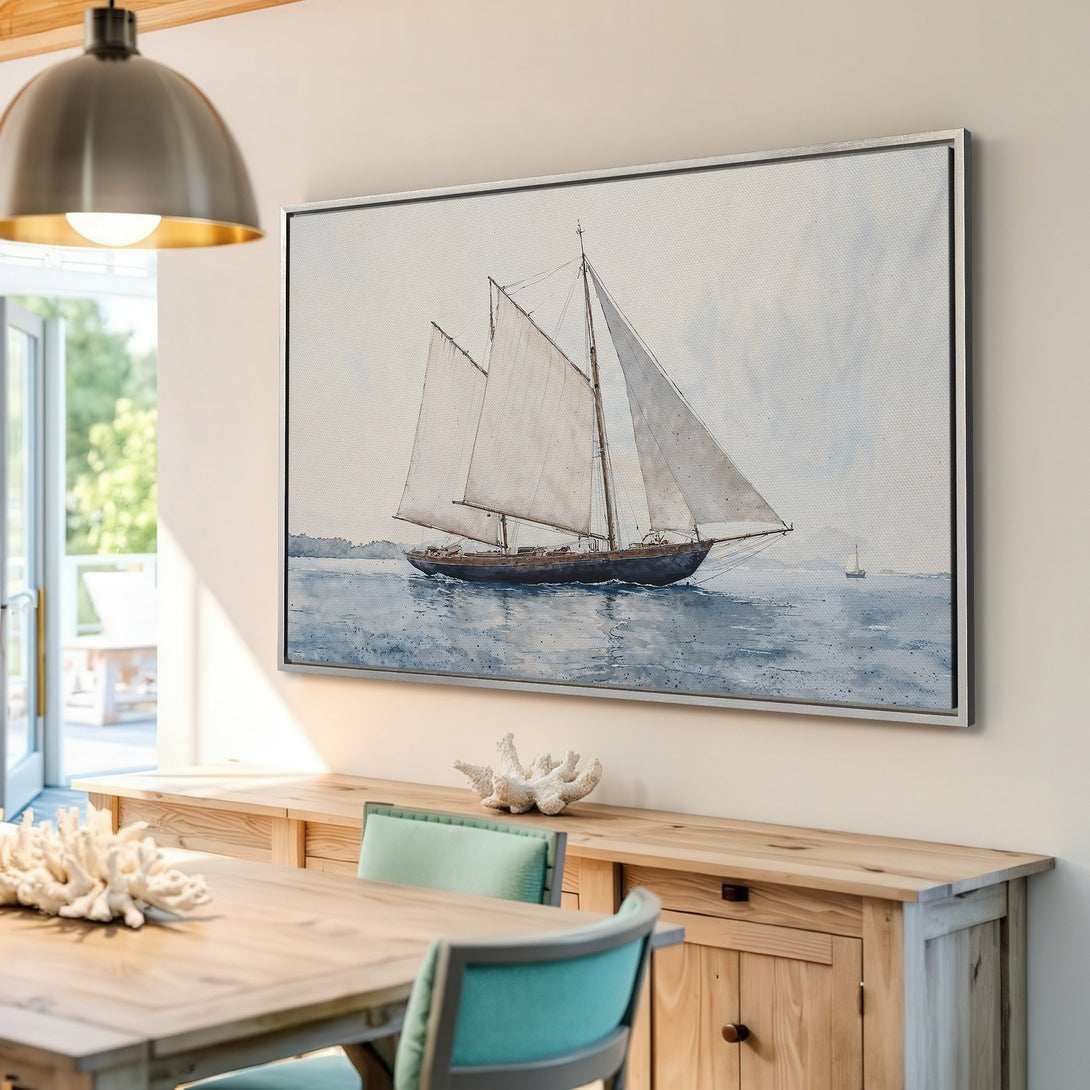 Framed Wall Art: Watercolor sailboat print with a calming blue and neutral palette. Coastal art perfect for adding a touch of serenity to any room.