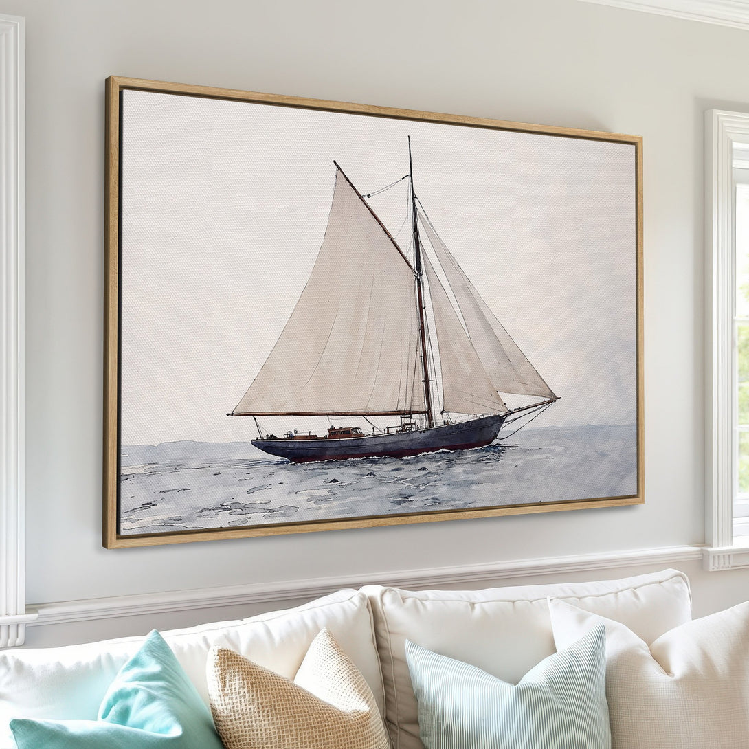 Framed Wall Art: Watercolor sailboat print in a coastal style. Features a calming blue and neutral color palette, perfect for living room decor.