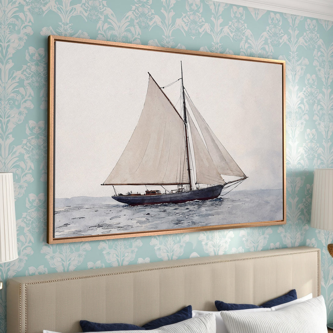 Framed Wall Art featuring a vintage sailboat painting in a serene, muted blue and gray palette. Perfect nautical decor for a bedroom.