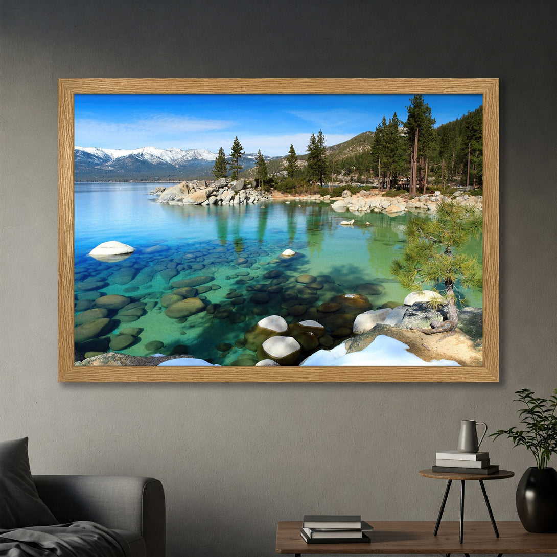 Framed Poster of a serene lake scene with clear turquoise water, mountains, and trees. Natural style, blue and green color palette.
