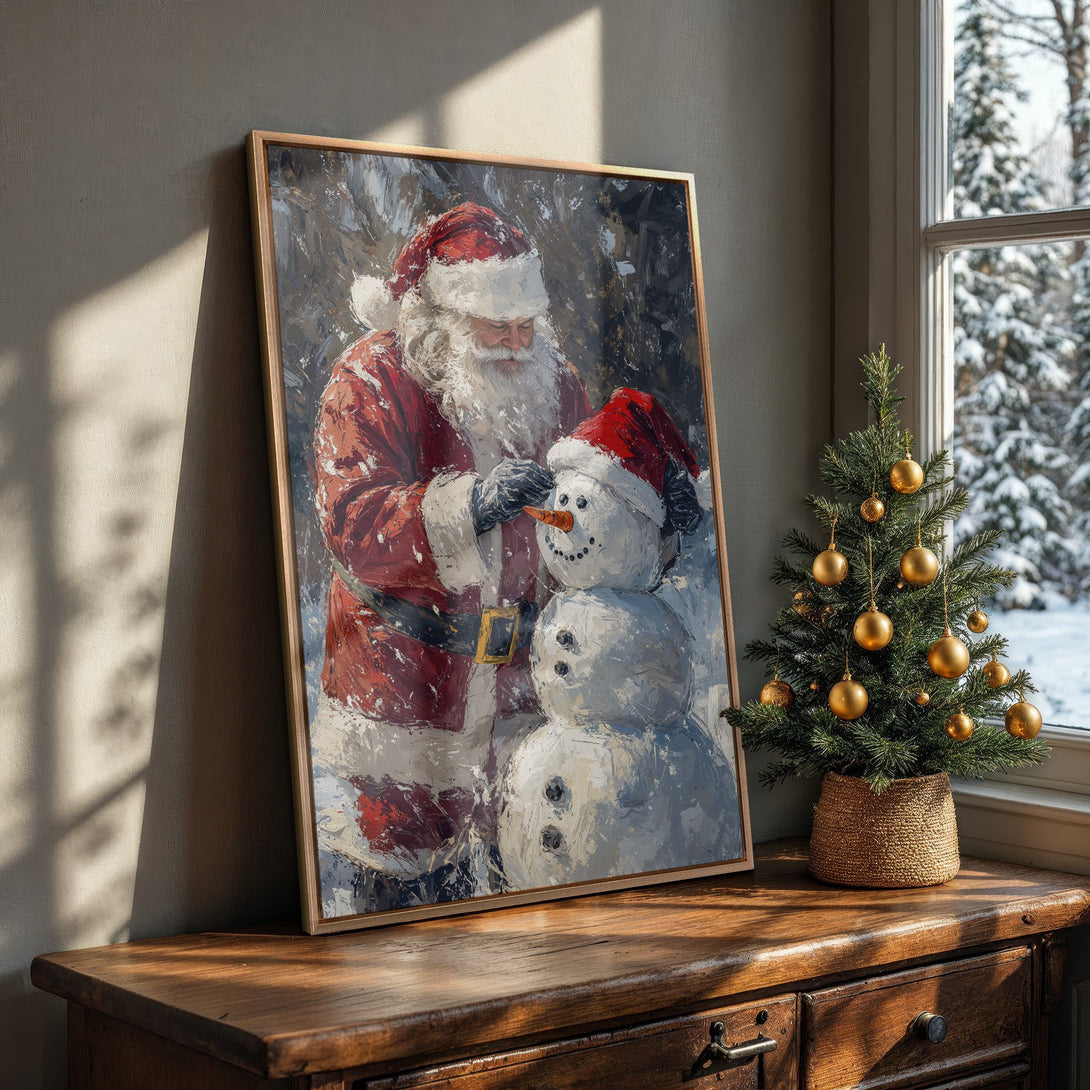 Framed Wall Art featuring Santa Claus building a snowman in a painterly style with a red, white, and blue color palette, perfect Christmas decor.