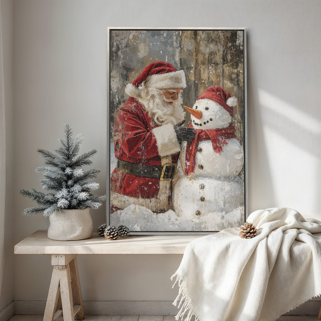 Framed Wall Art featuring Santa and a snowman in a rustic style with red and white tones. Perfect Christmas decor for your home!