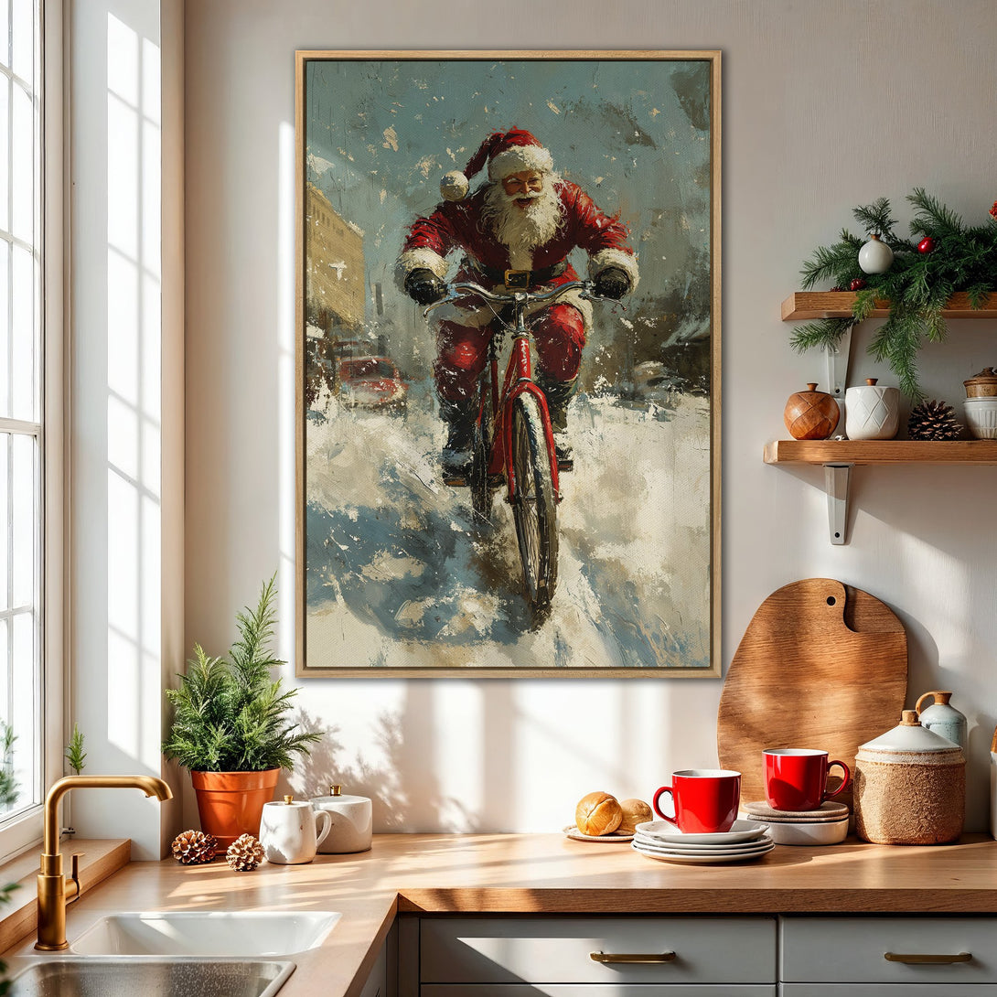 Framed Wall Art: Santa Claus on a bicycle in a snowy scene. Festive artwork with a red, white, and blue color palette, perfect for holiday decor.