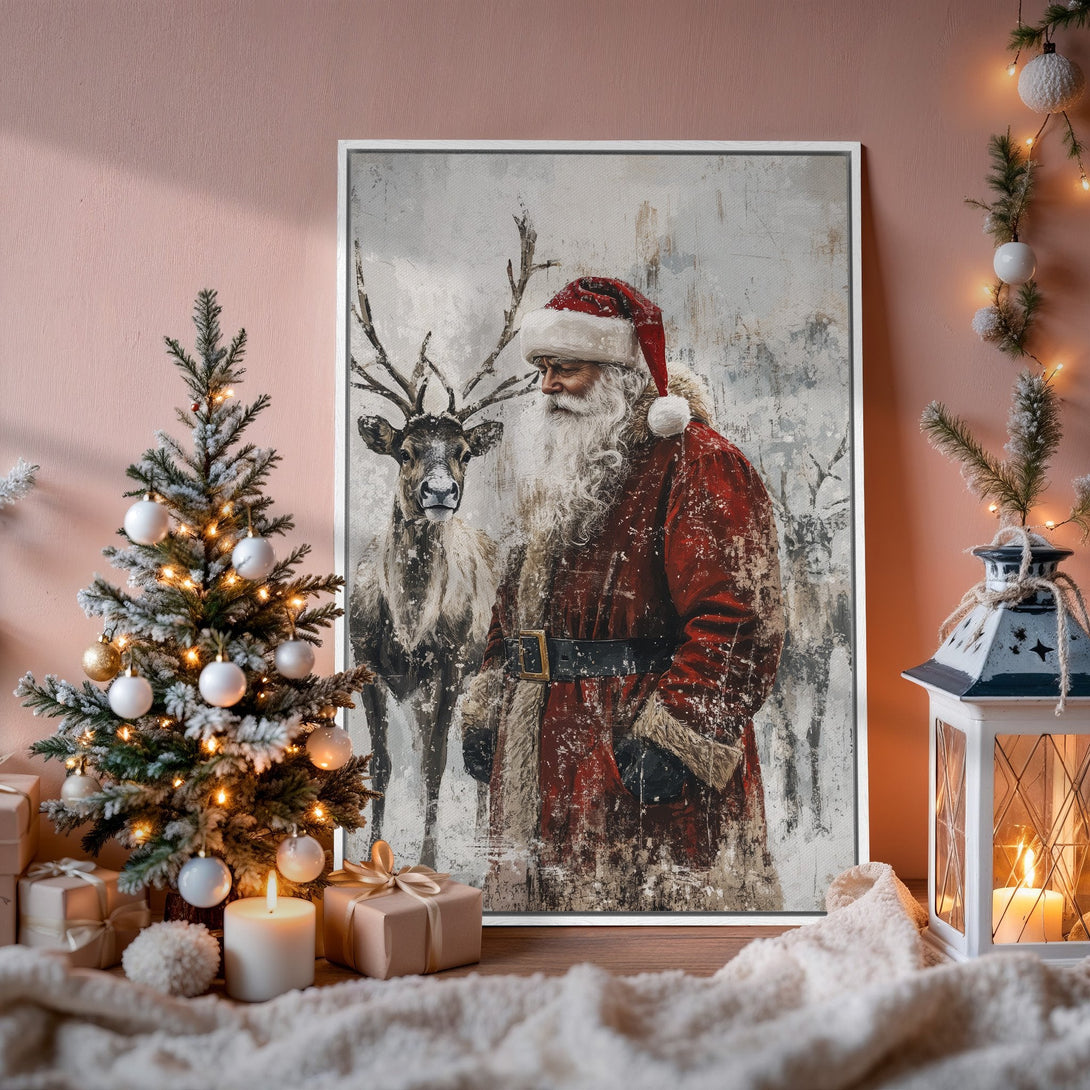 Framed Wall Art of Santa & Reindeer in a winter scene. Rustic style with red, white, and gray tones. Perfect Christmas decor!