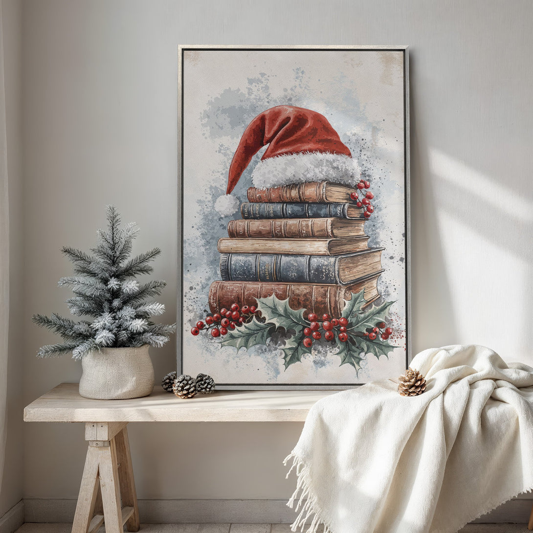 Framed Wall Art featuring a festive watercolor painting of books, Santa hat, and holly. Warm, inviting color palette perfect for Christmas decor.
