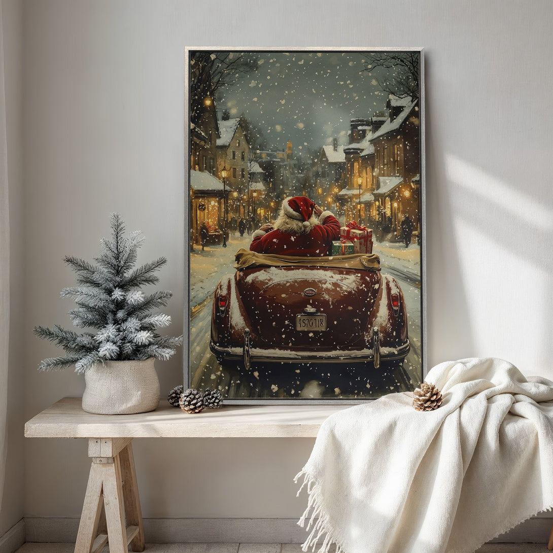 Framed Wall Art: Santa in a vintage car, driving through a snowy town. Warm, inviting color palette. Perfect Christmas decor!