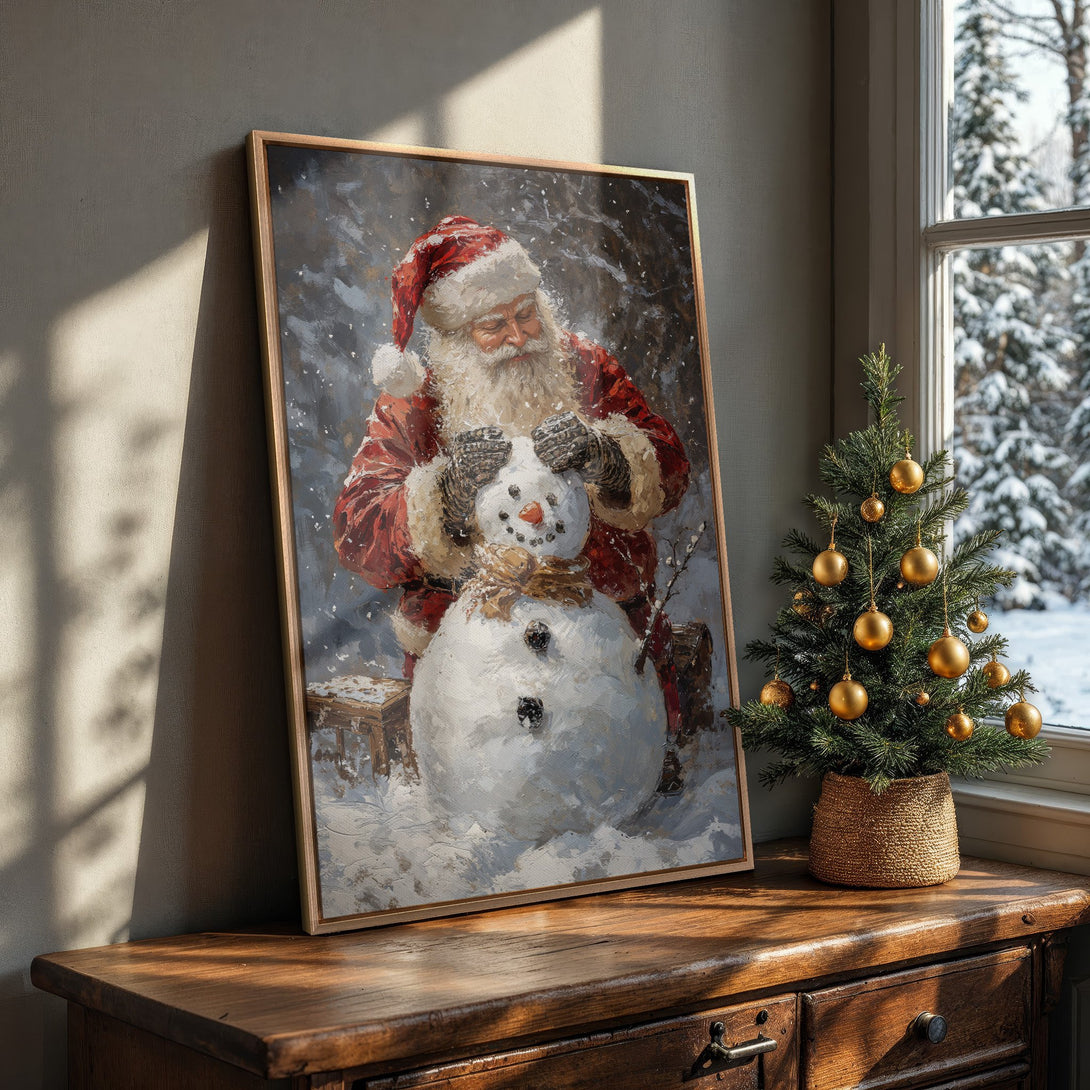 Framed Wall Art: Santa Claus building a snowman, festive oil painting. Rich red, white, and blue color palette. Perfect Christmas decor for your home.