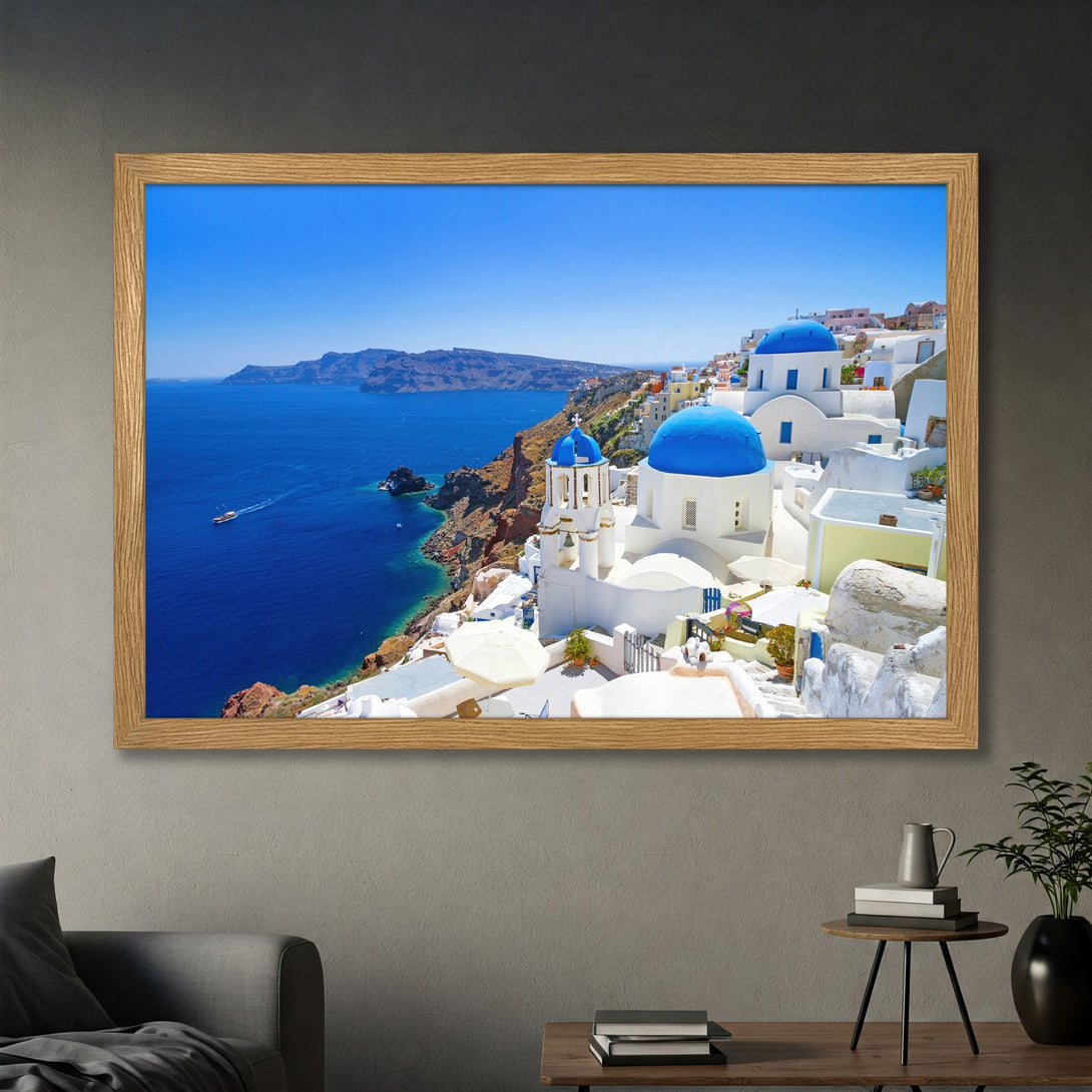 Framed Poster of Santorini, Greece. Stunning blue domes, white buildings, & sea. A vibrant travel art print for your home.