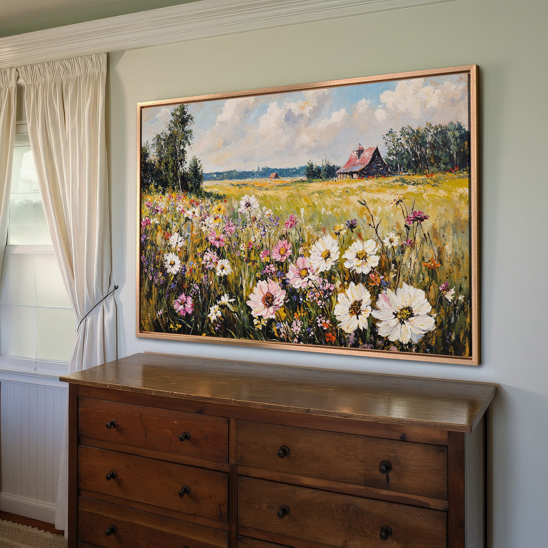 Framed Wall Art: Impressionistic field of wildflowers in a warm, inviting color palette of yellows, pinks, and blues. Perfect for adding a touch of nature.