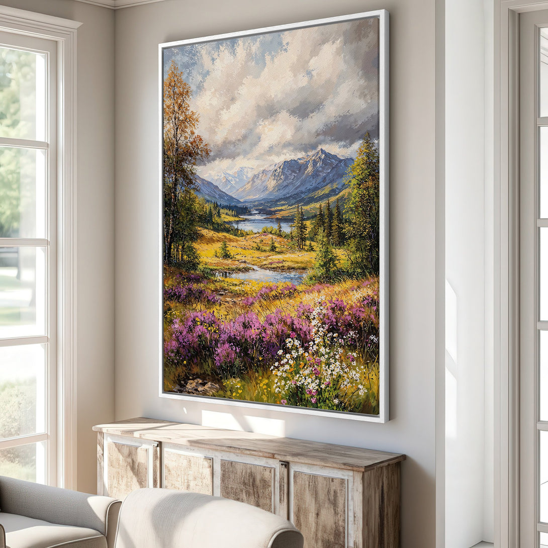 Framed Wall Art: Landscape painting with mountains, river, and wildflowers. Warm color palette with greens, purples, and yellows. Adds a touch of nature to your home.