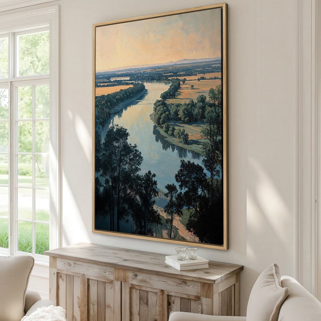 Framed Wall Art of a serene river landscape in muted blues, greens, and yellows. Enhance your home with this beautiful Canvas Print!