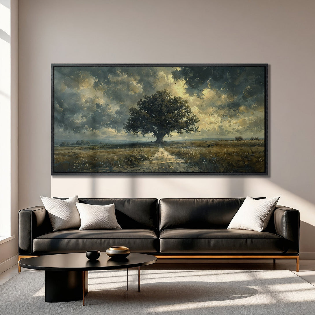 Framed Wall Art: Dramatic landscape Canvas Print featuring a lone tree, moody sky, and warm, earthy tones. Perfect for living room decor.