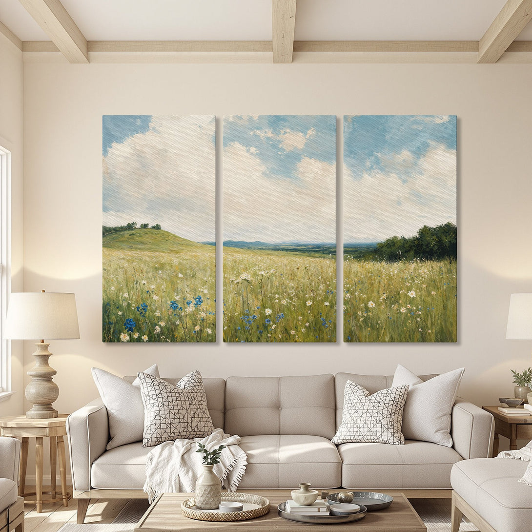 Canvas Print of a serene meadow landscape painting with blue sky and wildflowers. Soft, neutral color palette perfect for any home decor.