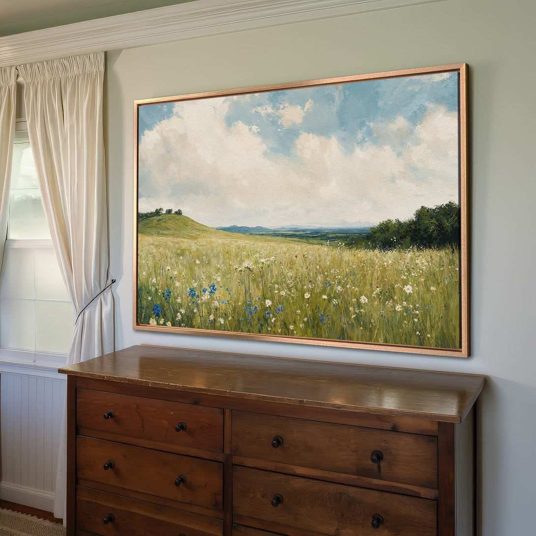 Framed Wall Art: Landscape Canvas Print with a field of wildflowers in a warm, inviting color palette, perfect for any home decor.