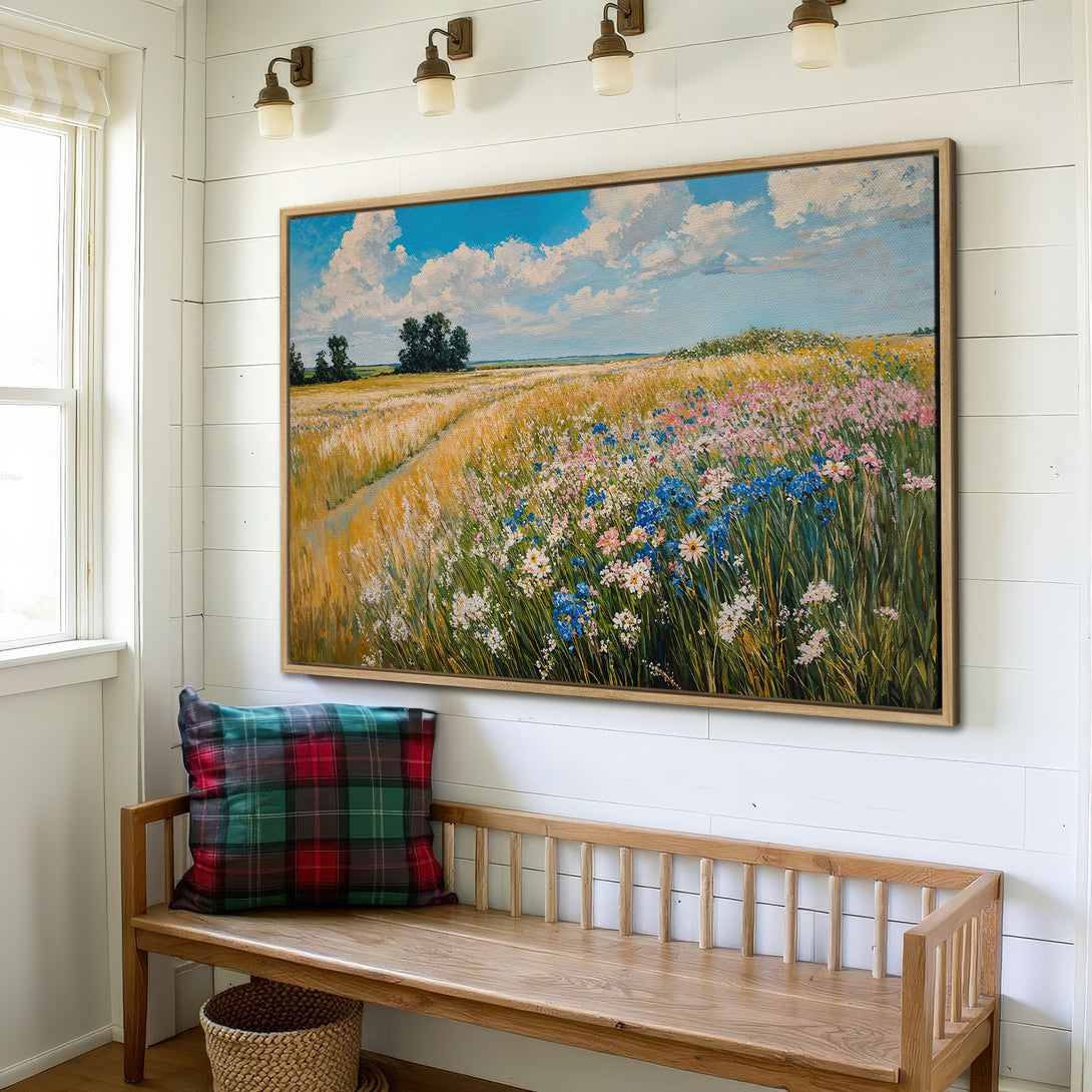 Framed Wall Art: Stunning landscape Canvas Print with wildflowers in a field. Warm yellow, blue, and pink color palette. Perfect for adding a touch of nature to your home.