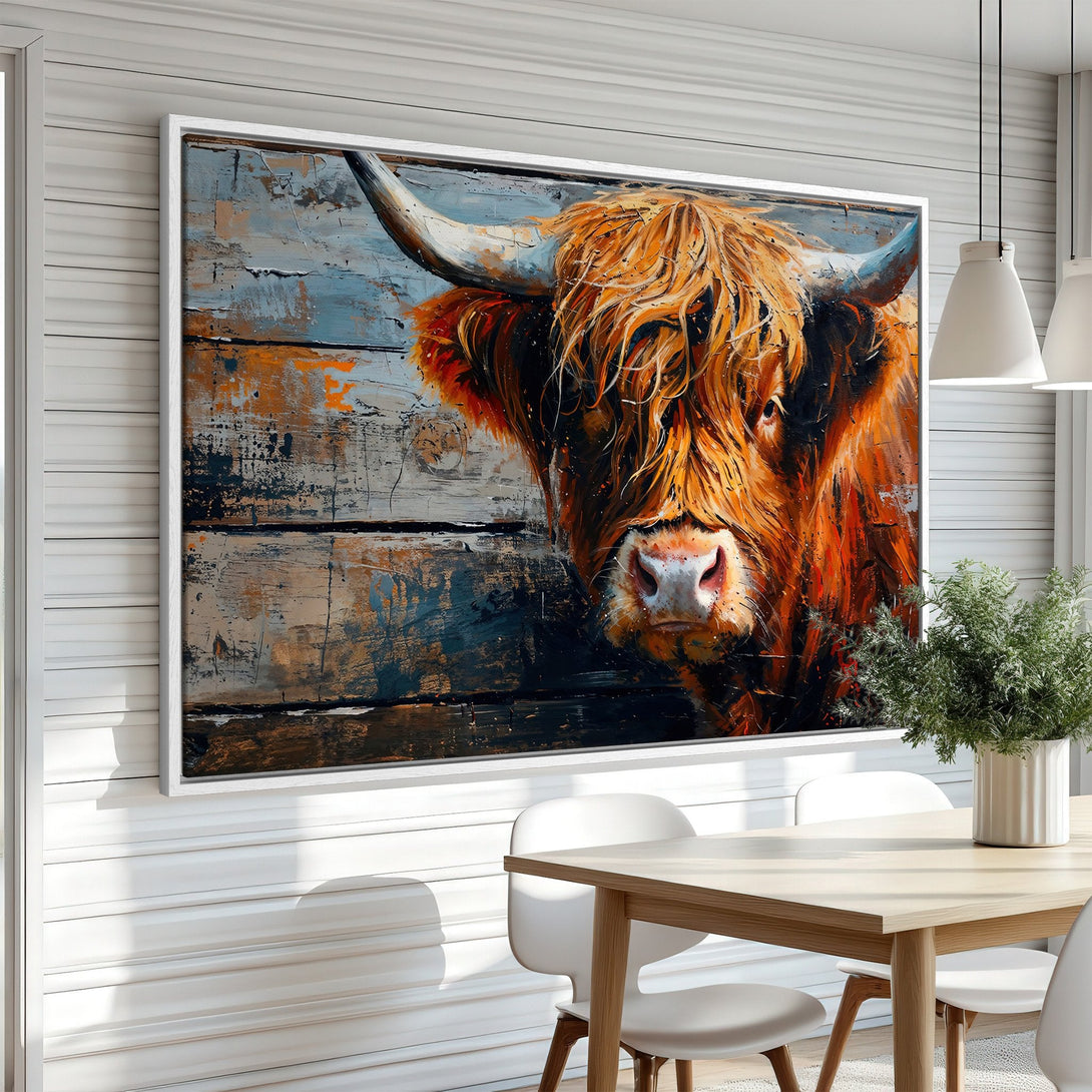 Framed Wall Art: Highland cow painting in warm orange & blue tones. Rustic style canvas print adds charm to any dining room or living space.