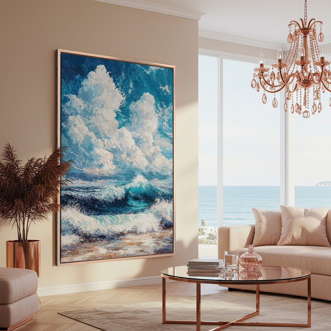 Framed Wall Art: Ocean wave painting in a modern living room. Blue and white seascape canvas print with a neutral, warm color palette. Coastal decor.