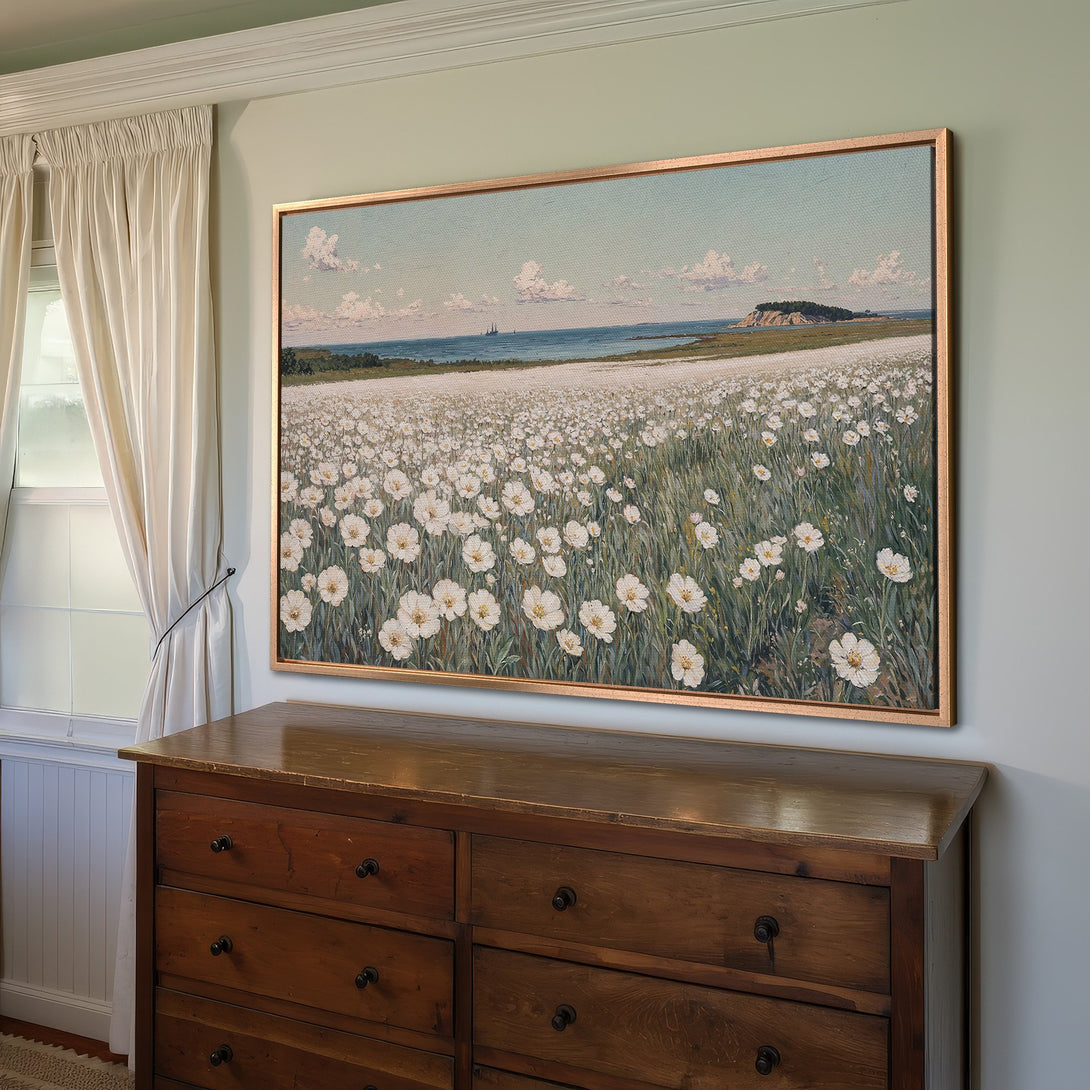 Framed Wall Art: Coastal landscape Canvas Print with white flowers, blue sky, and green accents. Perfect for adding a touch of nature's beauty to your home.