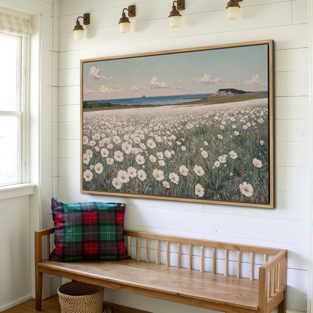 Framed Wall Art: Coastal landscape Canvas Print with white flowers, blue sky, and green grass. Rustic style, neutral color palette, perfect for home decor.