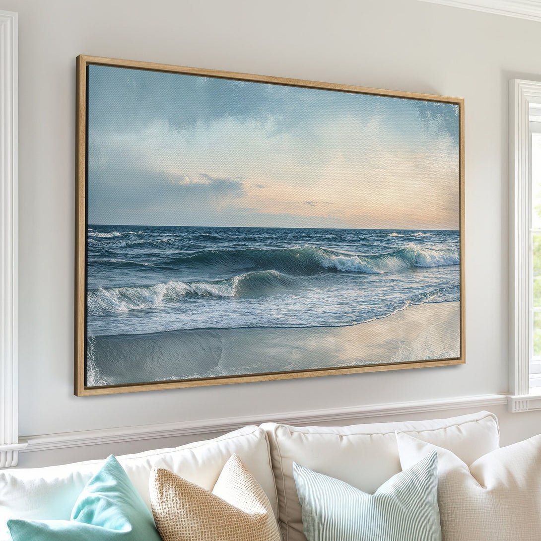 Framed Wall Art: Serene ocean waves Canvas Print in calming blue and beige tones. Coastal art for a tranquil living room.