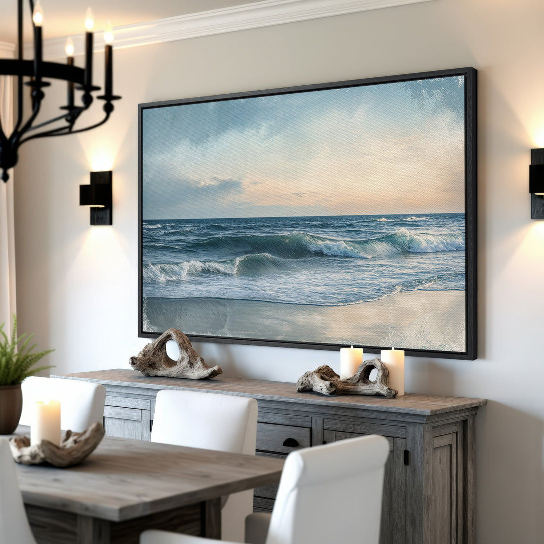 Framed Wall Art: Coastal canvas print featuring ocean waves in a serene blue and neutral color palette. Perfect for adding a touch of calm to your home decor.