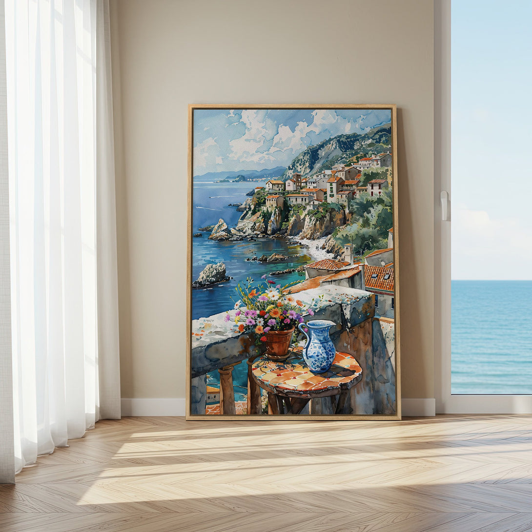 Framed Wall Art: Coastal watercolor painting of a village by the sea in blue, green, and warm earth tones. Perfect for adding a touch of serenity to your home.