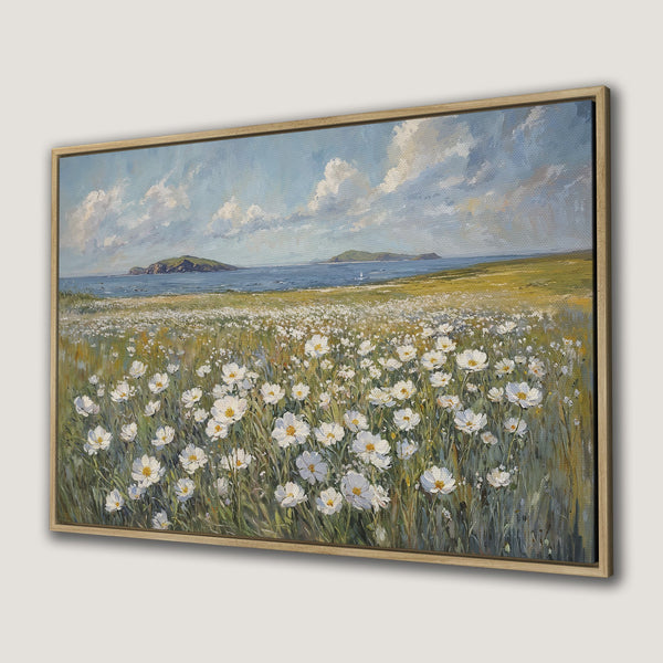 Canvas Print of a serene coastal landscape with white flowers, blue sky, and green fields. Impressionistic style, neutral color palette.