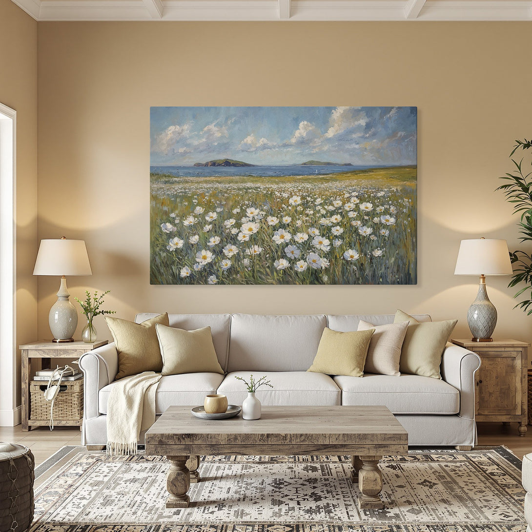 Framed Wall Art: Coastal landscape Canvas Print with white flowers, blue sky, and green fields. Adds a touch of nature's beauty to any room.