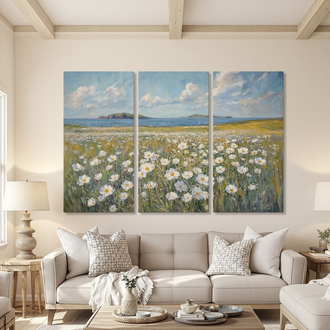 Canvas Print of a coastal landscape painting with white flowers, blue sky, and green fields. Adds a touch of nature with a calming color palette.