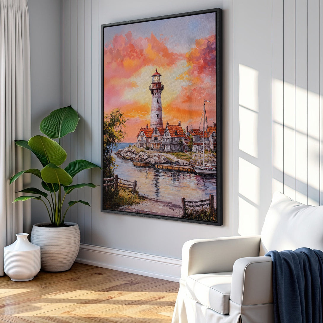 Framed Wall Art: Lighthouse painting with warm sunset colors. Coastal art in a living room setting. Add a touch of serenity to your home decor.