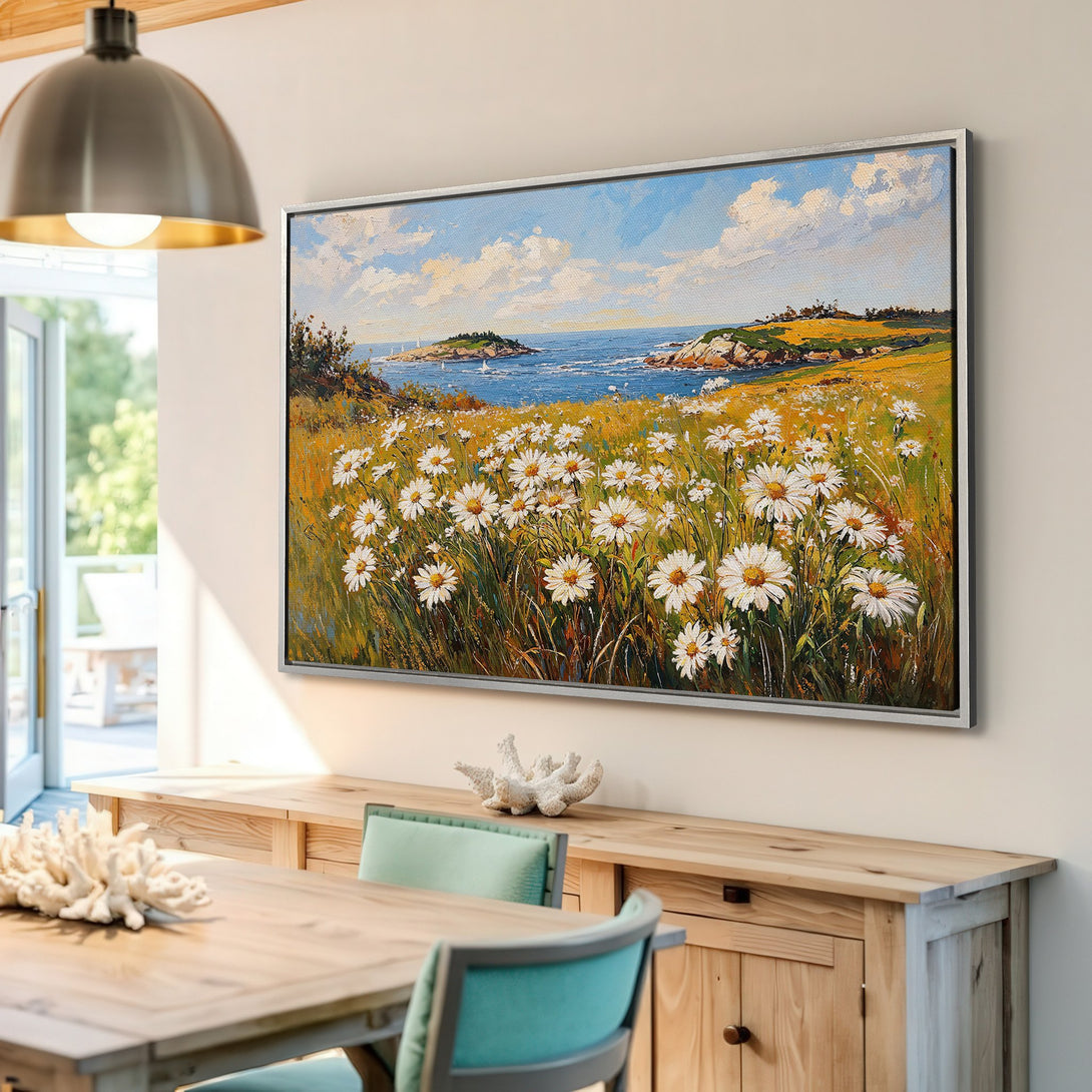 Framed Wall Art: Impressionist landscape Canvas Print with daisies, ocean, and blue sky. Warm color palette adds a touch of nature to any room.