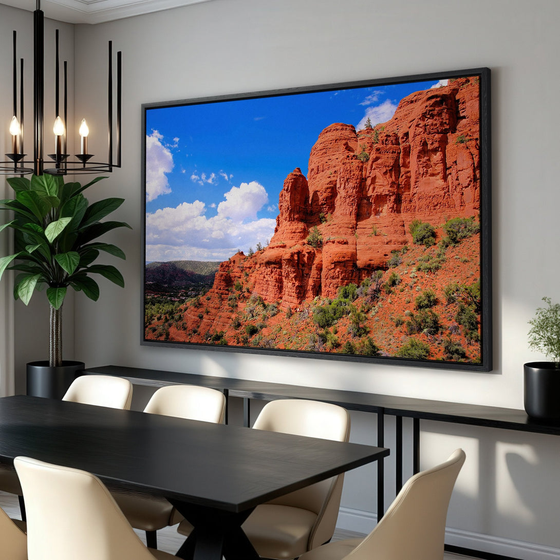 Framed Wall Art featuring a stunning desert landscape. Vibrant red rock formations against a blue sky. Add a touch of nature's beauty to your home!