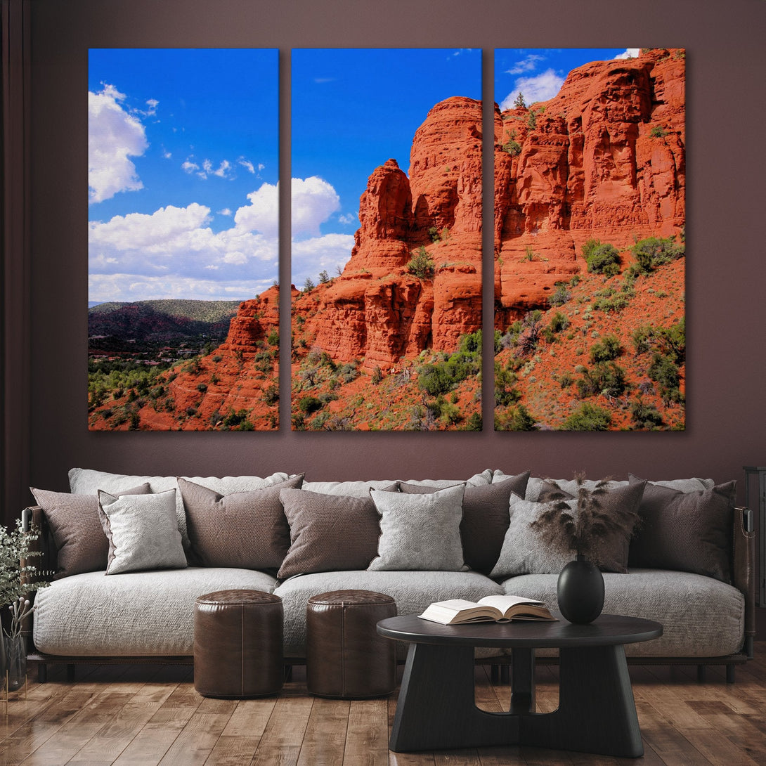Canvas Print of stunning red rock landscape with blue sky and clouds, perfect for adding a touch of nature to your home decor.