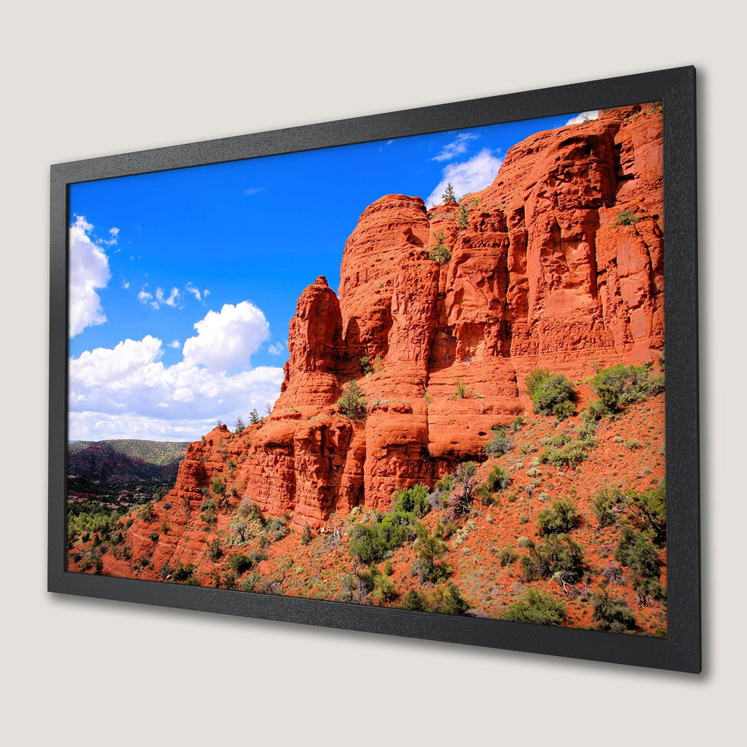 Framed Poster of red rock landscape with blue sky, vibrant colors. Perfect wall art!